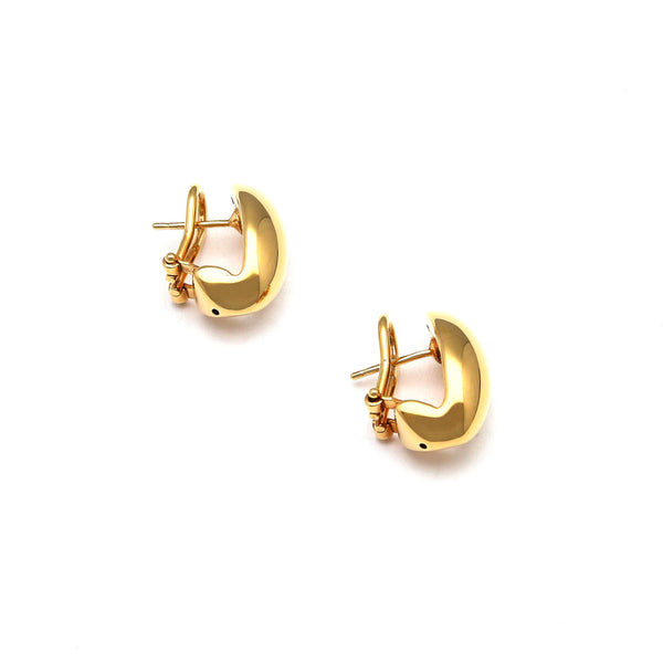 Aretes huecos en oro amarillo 14 kilates.