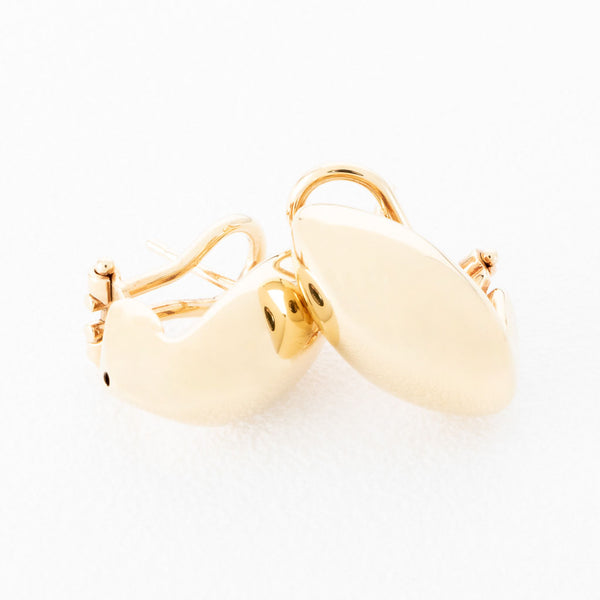 Aretes huecos en oro amarillo 14 kilates.