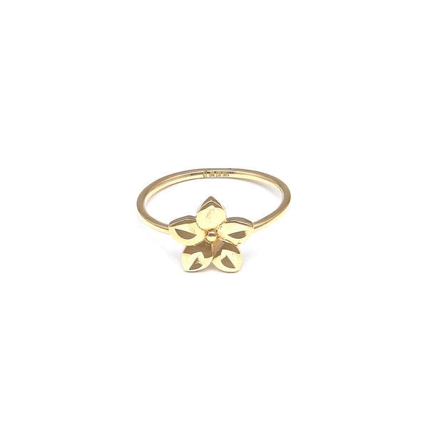 Anillo diseño especial motivo flor en oro amarillo 14 kilates.