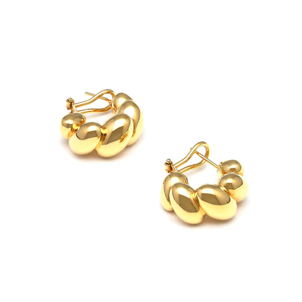 Aretes huecos en oro amarillo 14 kilates.