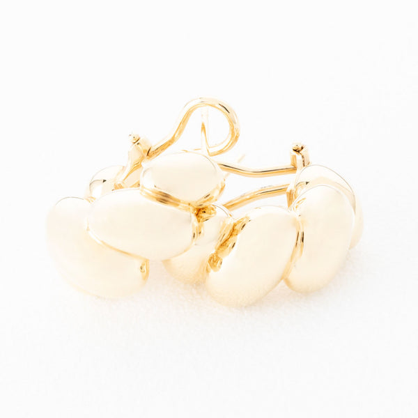 Aretes huecos en oro amarillo 14 kilates.