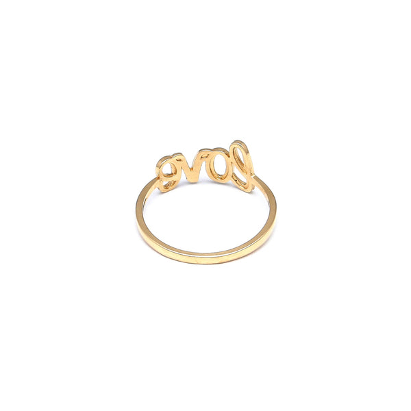 Anillo calado motivo letras en oro amarillo 14 kilates.