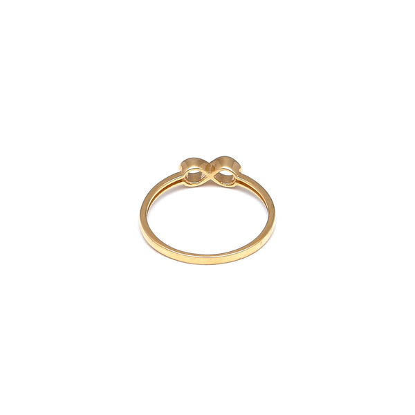 Anillo calado motivo infinito en oro amarillo 14 kilates.