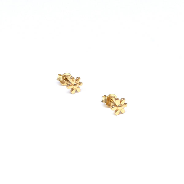 Aretes diseño especial motivo flor en oro amarillo 14 kilates.