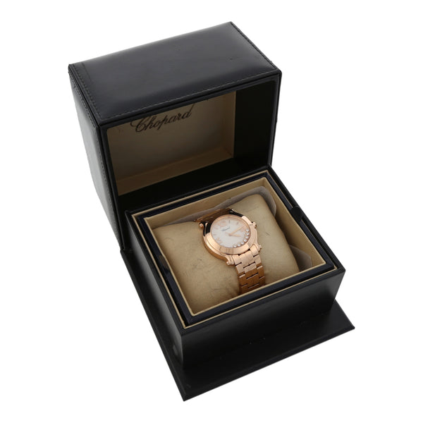 Reloj Chopard para dama modelo Happy Sport en oro rosa 18 kilates.