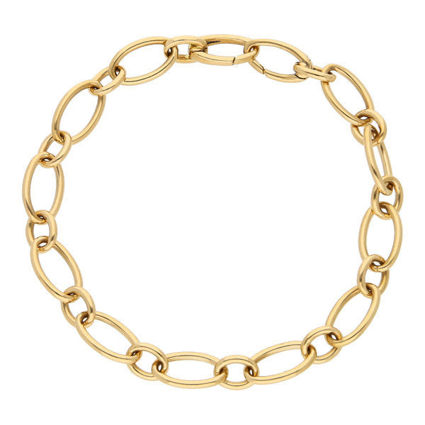 Pulsera eslabón cruzado combinado firma Tiffany & Co en oro amarillo 18 kilates.