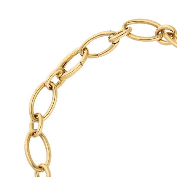 Pulsera eslabón cruzado combinado firma Tiffany & Co en oro amarillo 18 kilates.