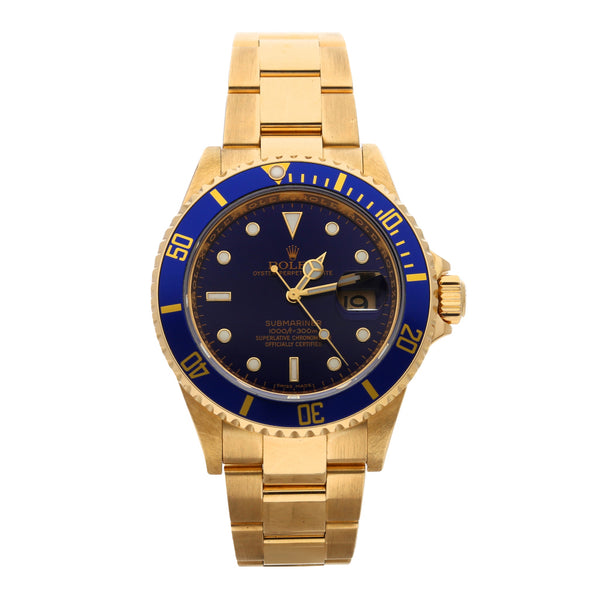 Reloj Rolex para caballero modelo Oyster Perpetual Date Submariner en oro amarillo 18 kilates.