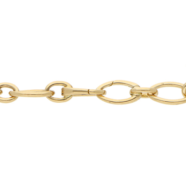 Pulsera eslabón cruzado combinado firma Tiffany & Co en oro amarillo 18 kilates.