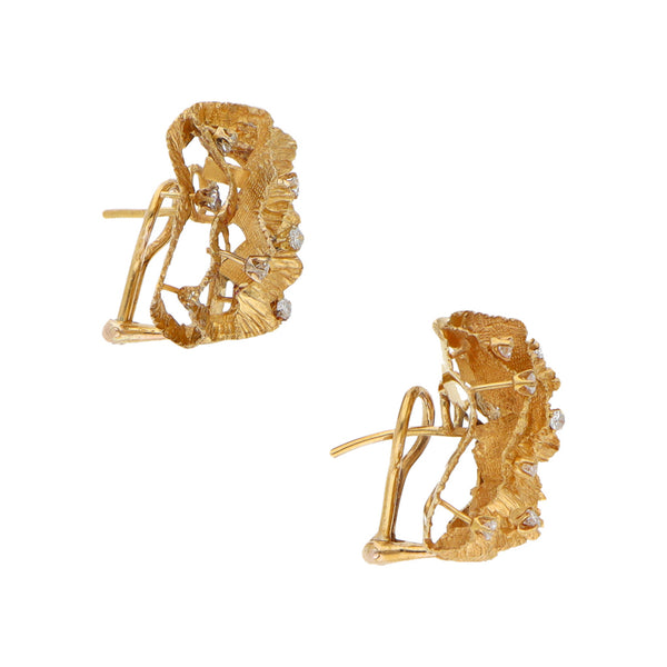 Aretes calados con diamantes en oro amarillo 16 kilates.