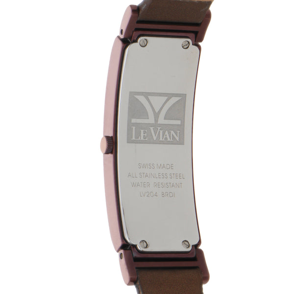 Reloj Le Vian para dama en acero PVD correa textil con piel.