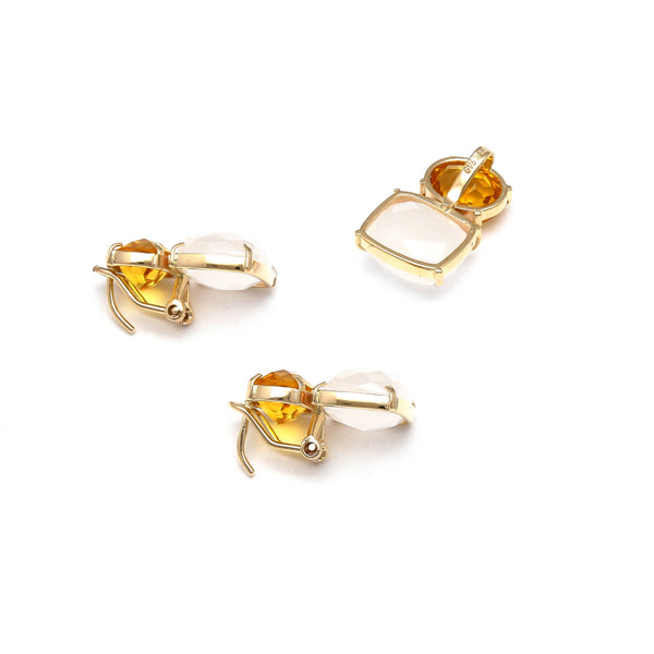 Juego de aretes y dije estilizados con citrinos y piedra de luna en oro amarillo 14 kilates.