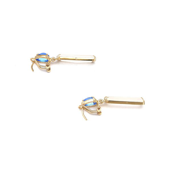 Aretes diseño especial con piedra luna y topacio azul en oro amarillo 14 kilates.