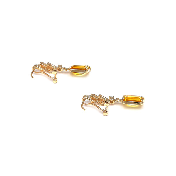 Aretes articulados con citrinos y circonias en oro amarillo 14 kilates.