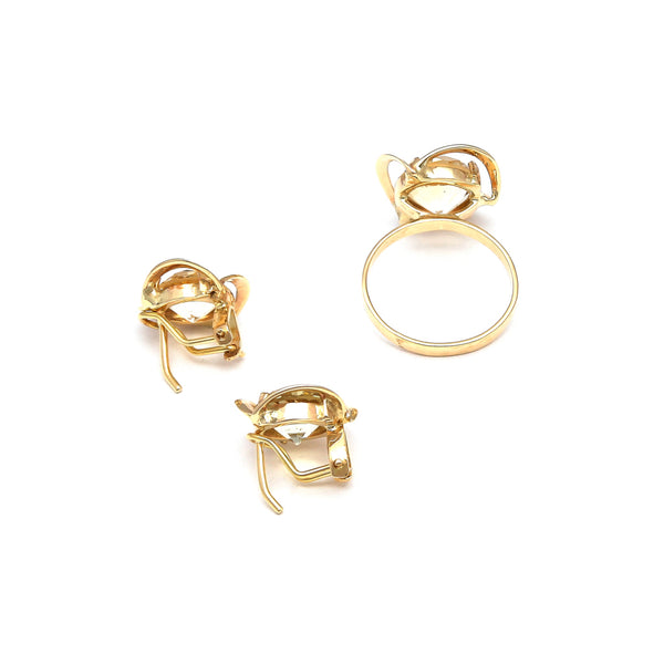 Juego de anillo y aretes calados con citrinos en oro amarillo 14 kilates.