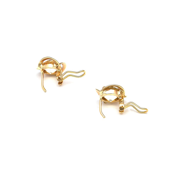 Juego de anillo y aretes calados con citrinos en oro amarillo 14 kilates.