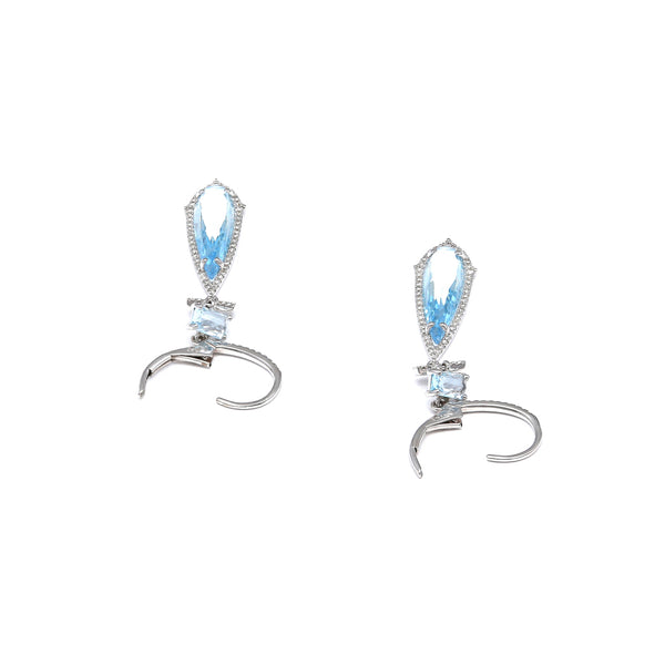 Aretes articulados con diamantes y topacio azul en oro blanco 14 kilates.