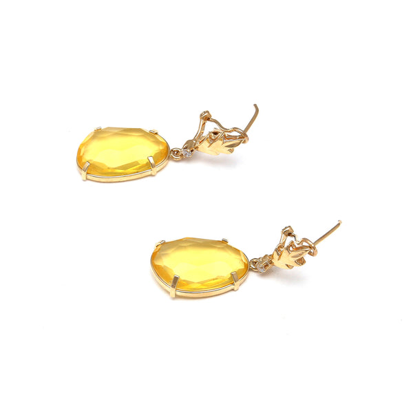 Aretes diseño especial con citrinos y circonias en oro amarillo 14 kilates.