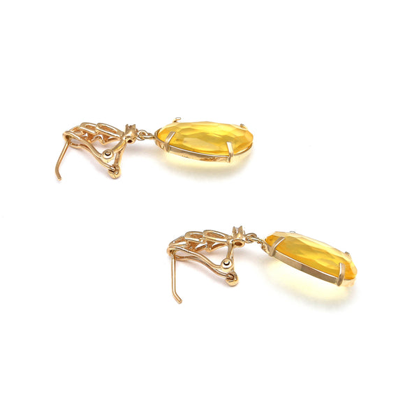 Aretes diseño especial con citrinos y circonias en oro amarillo 14 kilates.