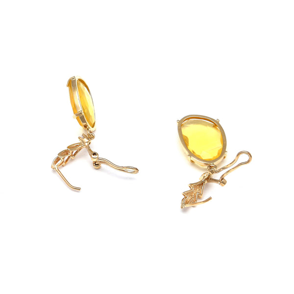 Aretes diseño especial con citrinos y circonias en oro amarillo 14 kilates.