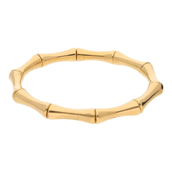 Pulsera ajustable eslabón hueco firma Gucci en oro amarillo 18 kilates.