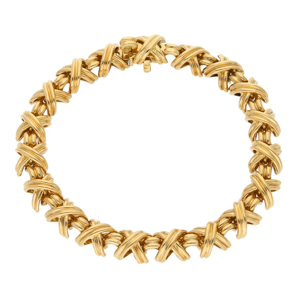 Pulsera eslabón combinado firma Tiffany & Co. en oro amarillo 18 kilates.