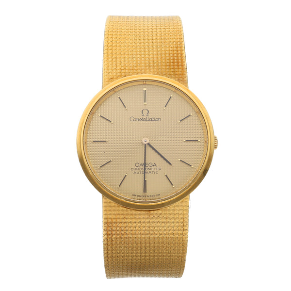 Reloj Omega para caballero modelo Constellation en oro amarillo 18 kilates.