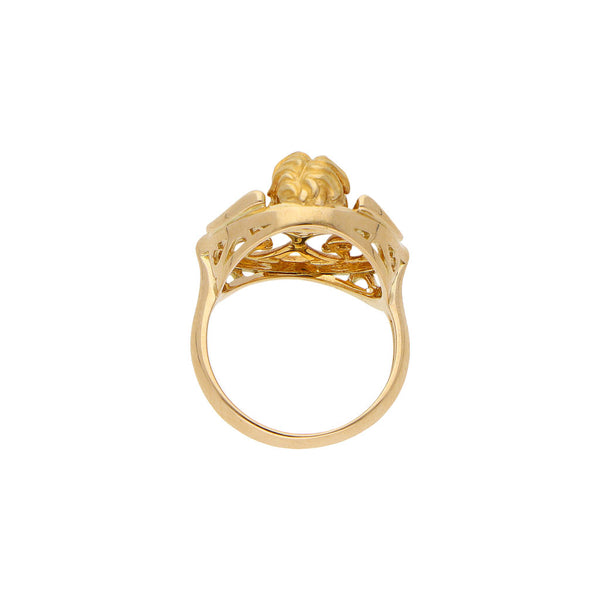 Anillo calado motivo querubín en oro amarillo 18 kilates.