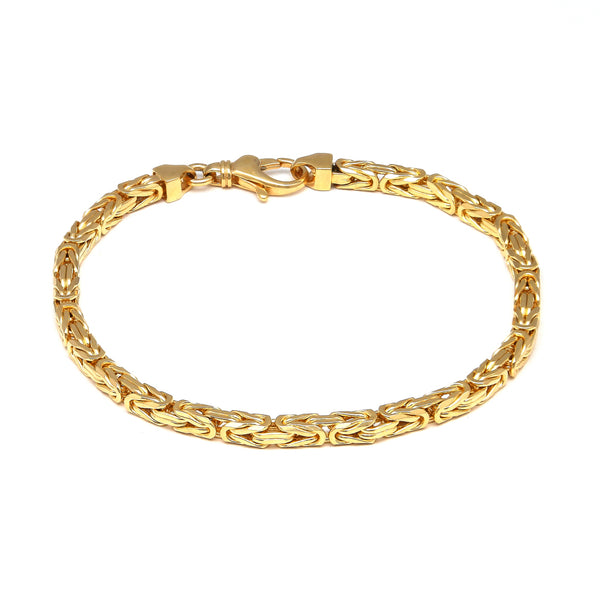 Pulsera eslabón tejido en oro amarillo 14 kilates.