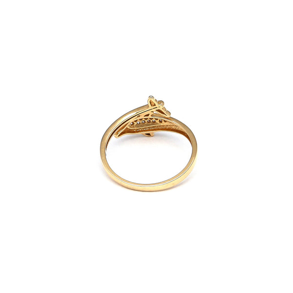 Anillo diseño especial motivo delfín con circonias en oro amarillo 14 kilates.