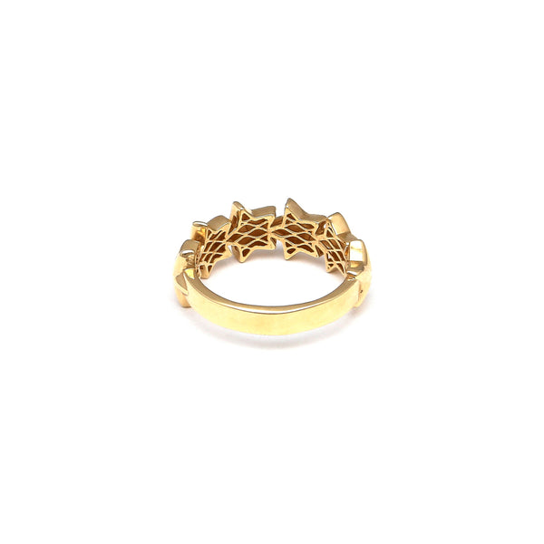 Anillo estilizado motivo estrellas en oro amarillo 14 kilates.