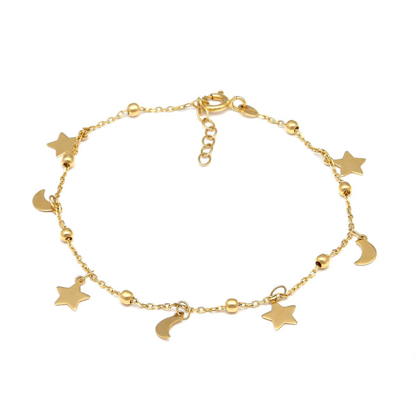 Pulsera eslabón cruzado con esferas y colgantes motivo lunas y estrellas en oro amarillo 14 kilates.