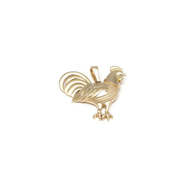 Dije estilizado motivo gallo en oro amarillo 14 kilates.