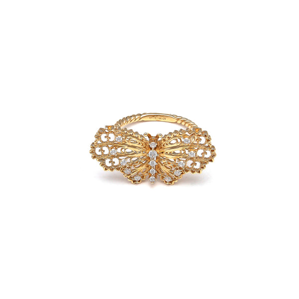 Anillo trenzado motivo mariposa con circonias en oro amarillo 14 kilates.