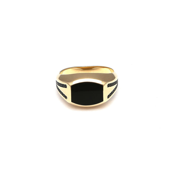 Anillo tipo sello con ónix en oro amarillo 14 kilates.