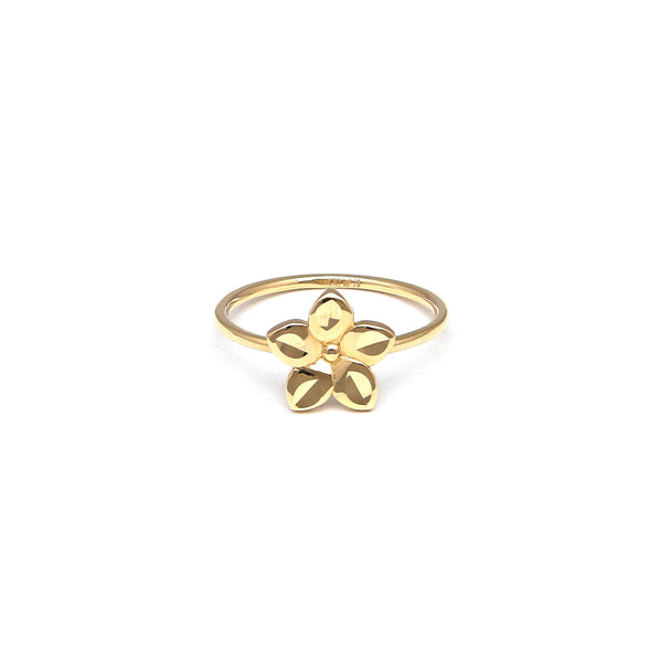 Anillo liso motivo flor en oro amarillo 14 kilates.