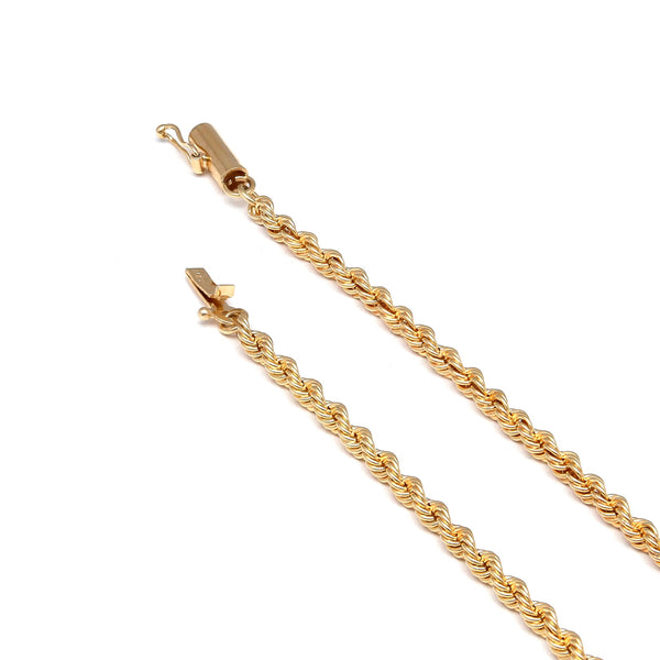 Pulsera torzal en oro amarillo 14 kilates.