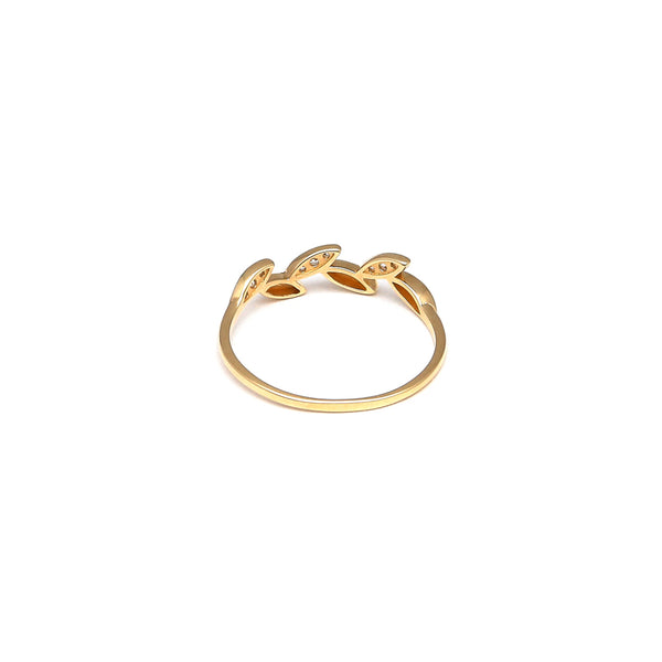 Anillo diseño especial motivo hojas con circonias en oro amarillo 14 kilates.