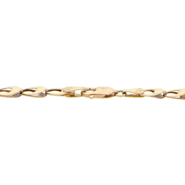 Pulsera eslabón laminado en oro amarillo 14 kilates.