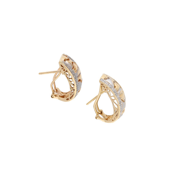 Aretes estilizados con diamantes en oro amarillo 14 kilates.