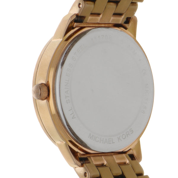 Reloj Michael Kors para dama Modelo Argyle Logo Rose Gold.