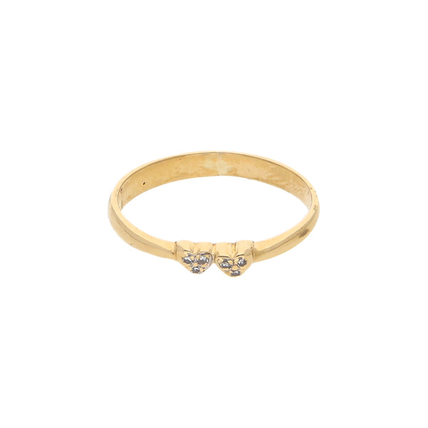 Anillo liso motivo corazones con diamantes en oro amarillo 18 kilates.