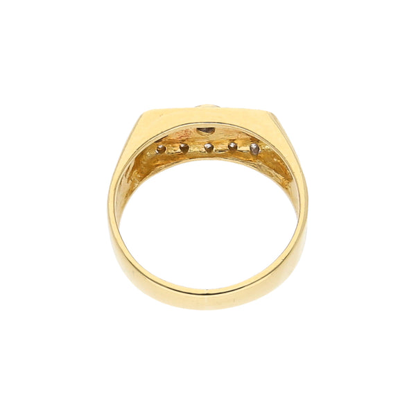 Anillo diseño especial motivo tornillos simulados con diamantes en oro amarillo 18 kilates.