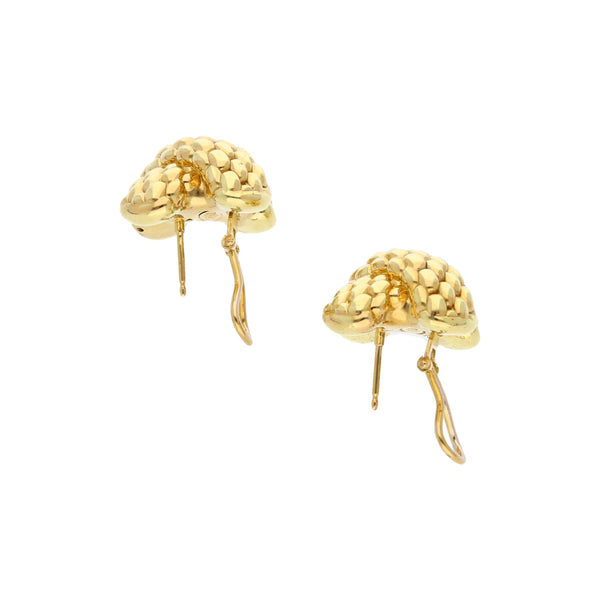 Aretes huecos en oro amarillo 18 kilates.