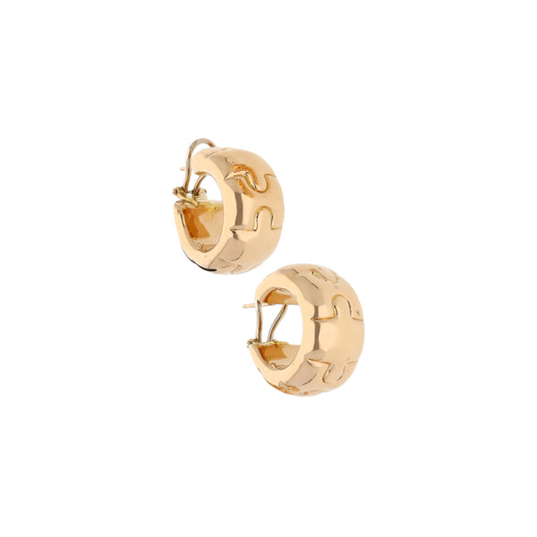 Aretes huecos en oro amarillo 14 kilates.