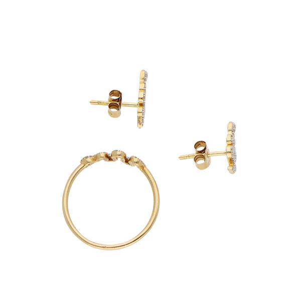 Juego de anillo y broqueles diseño especial motivo serpiente con diamantes firma Tous en oro amarillo 18 kilates.