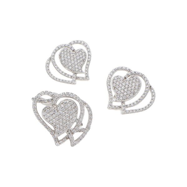 Juego anillo y broqueles estilizados motivo corazón con circonias en oro blanco 14 kilates.