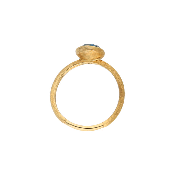 Anillo estriado con topacio en oro amarillo 18 kilates.