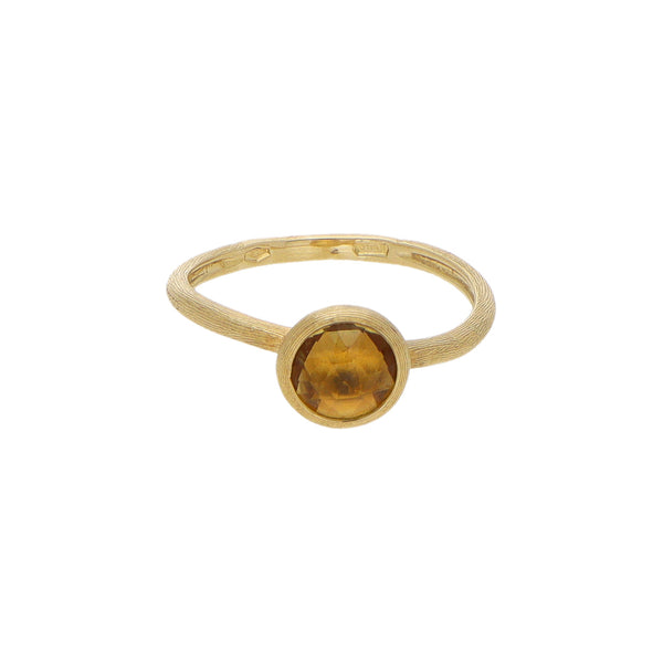 Anillo diseño especial con sintético en oro amarillo 18 kilates.