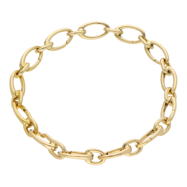 Pulsera eslabón combinado firma Tiffany & Co. en oro amarillo 18 kilates.